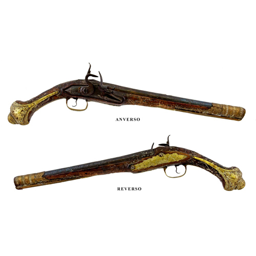 Sub.:6 - Lote: 290 - Cataluña, S. XVIII Pistola de pedernal en madera de nogal tallada con aplicaciones cinceladas en bronce.